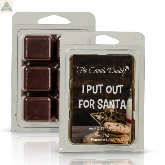 Two packs of Candle Daddy wax melts are shown. One, called "I Put Out For Santa - Funny Chocolate Chip Cookie Scented," features an image of cookies and milk, and the other displays six chocolate chip cookie scented wax melts.