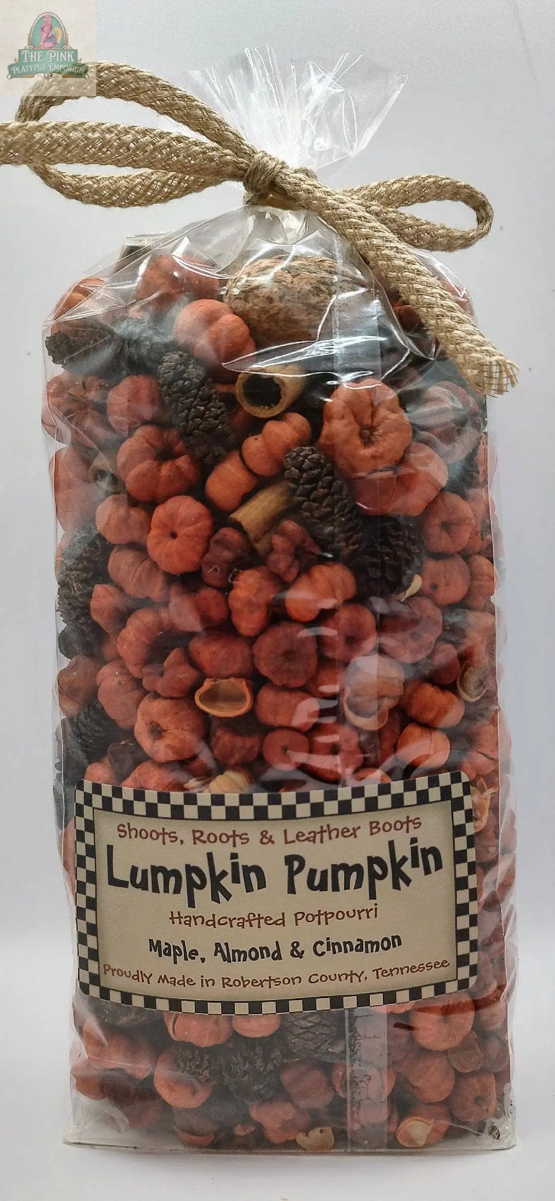 The 'Lumpkin Pumpkin' Handcrafted Potpourri (5 cups) features orange and brown botanicals with maple, almond & cinnamon scents. Made in Robertson County, TN, it's perfect for home fragrance or as a scented bowl filler.