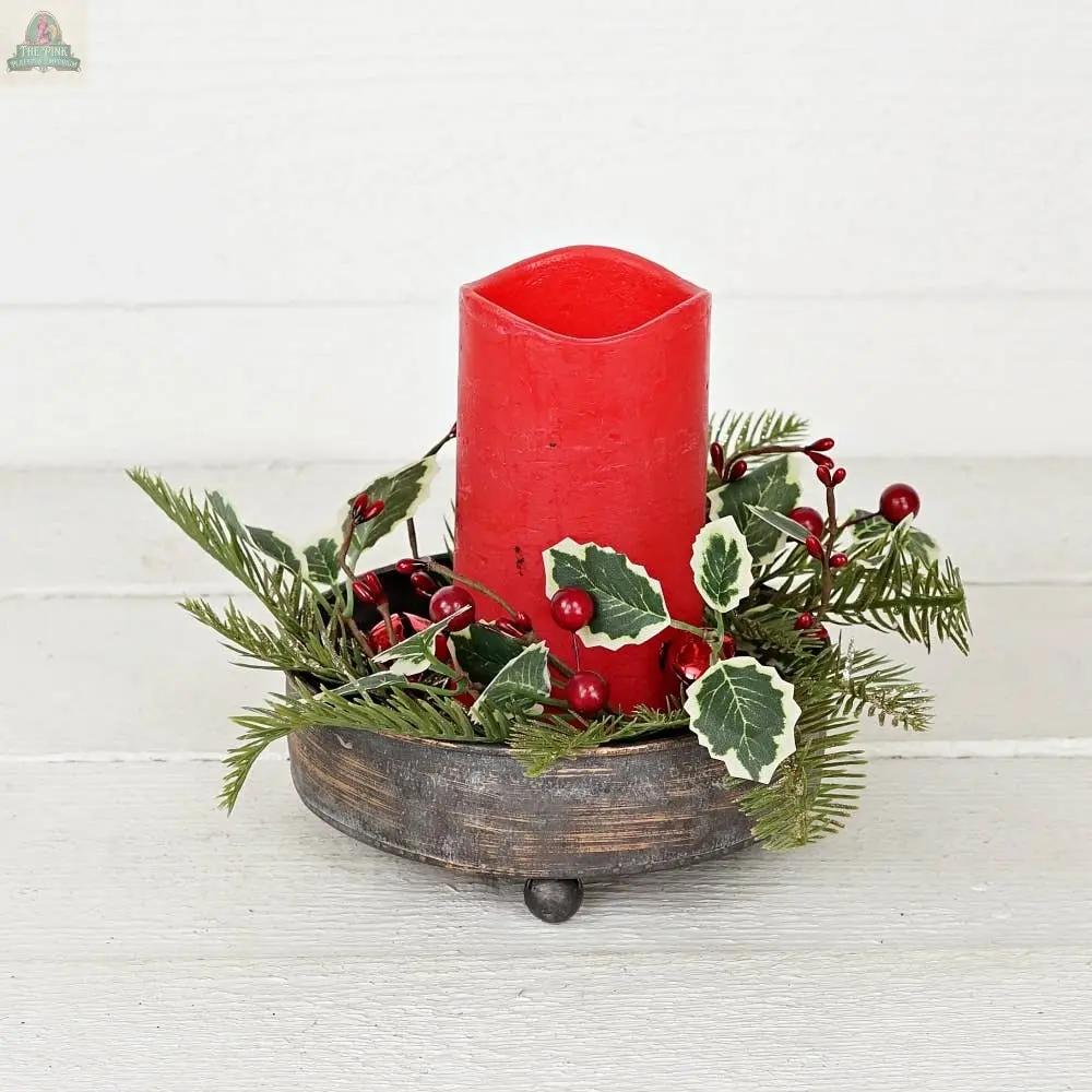 An Antique Pewter metal round Bowl container (6.5inD) from Impressive Enterprises, Inc. makes a stylish centerpiece, ideal for holiday table decor when filled with artificial pine, holly leaves, and red berries.
