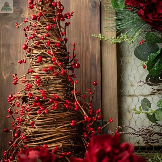 The 21" mixed berry cone tree with rust stars and a 6.25" base makes a festive centerpiece with its woven twig design, red berries, and rustic charm, ideal for holiday decor with pine and red accents.