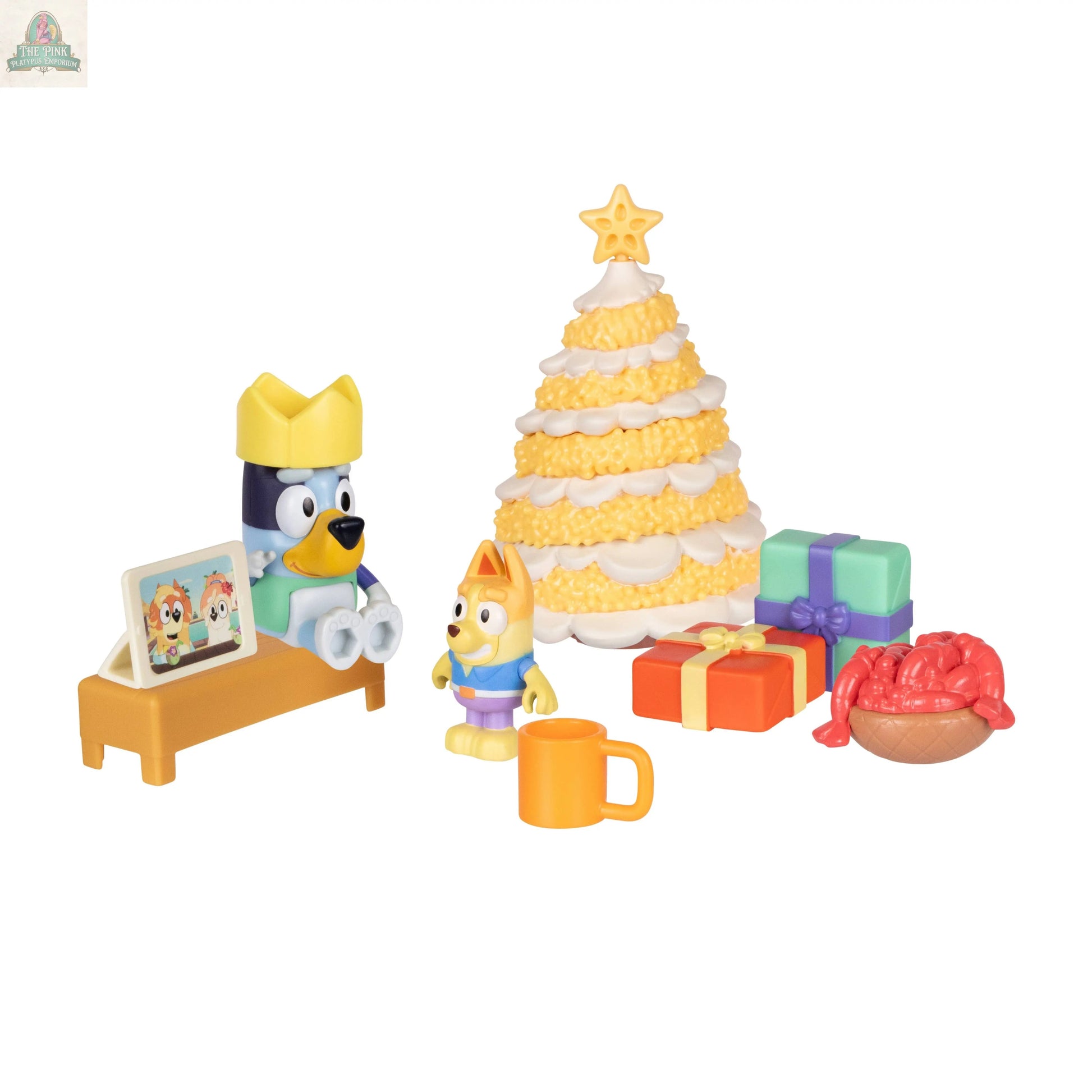 Discover the Bluey Advent Calendar, featuring Christmas toys like a character in a yellow crown, a cream and gold tree, gifts, a cozy mug, and more festive Bluey-themed surprises—perfect for holiday fun!.