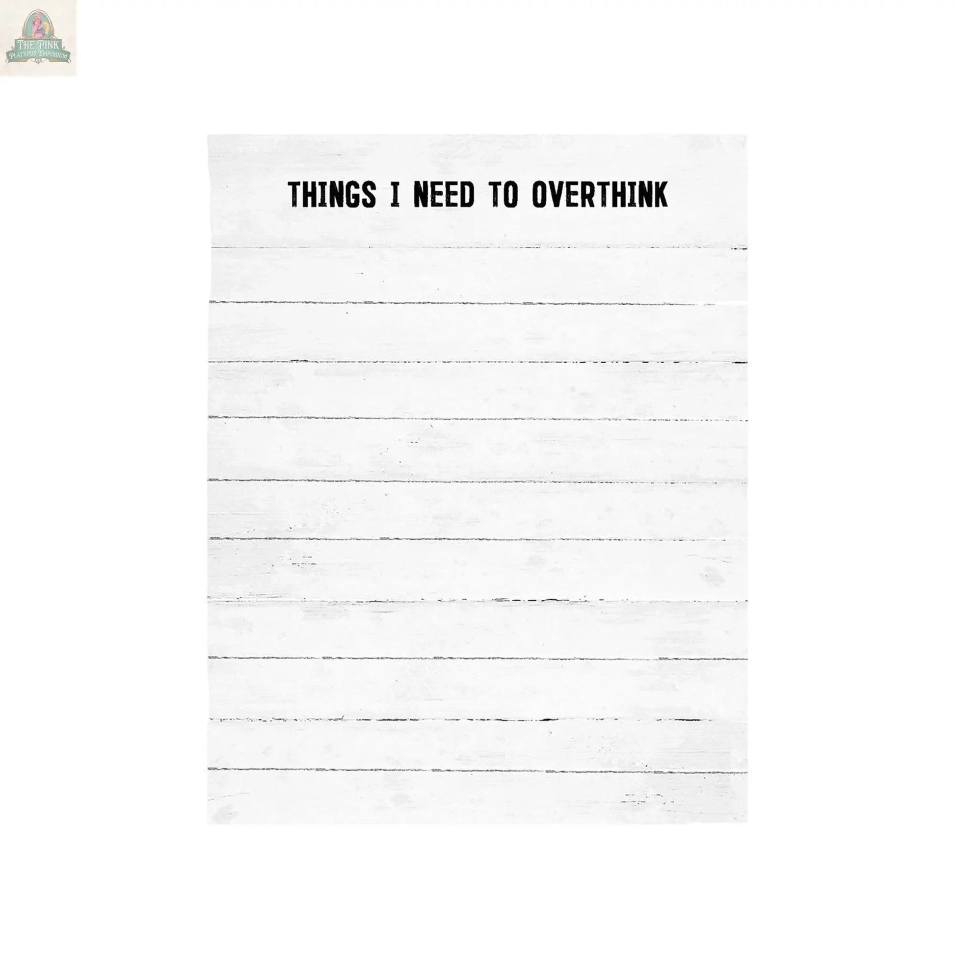 The Overthink Notepad features a white wood texture background and “THINGS I NEED TO OVERTHINK” printed in bold, black letters at the top, with blank lines below for jotting down your thoughts and ideas.