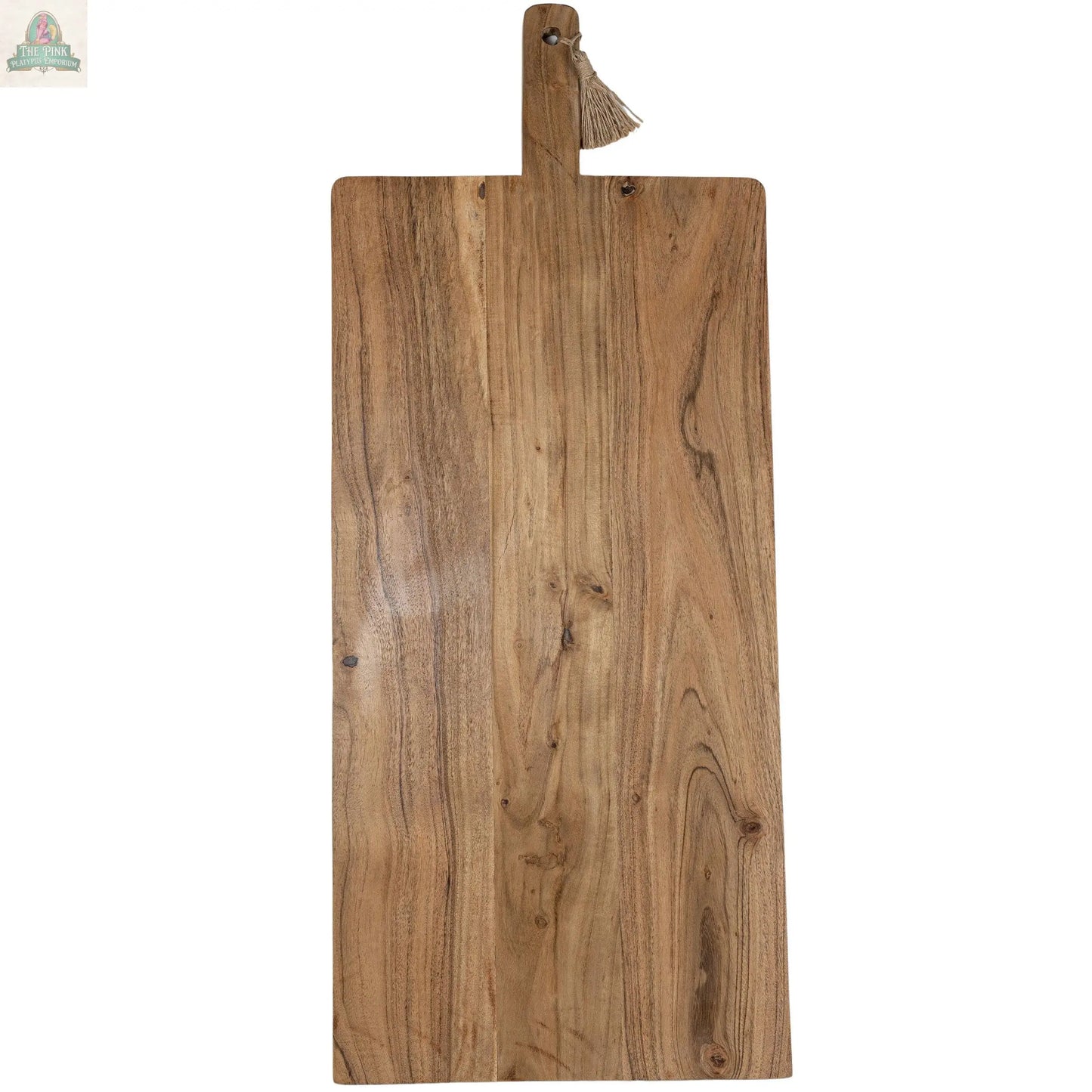 The 38 Inch Oversized Cutting Board/Charcuterie Board is a rectangular acacia wood board with a handle and small tassel, featuring a natural grain pattern—ideal for rustic kitchen decor.
