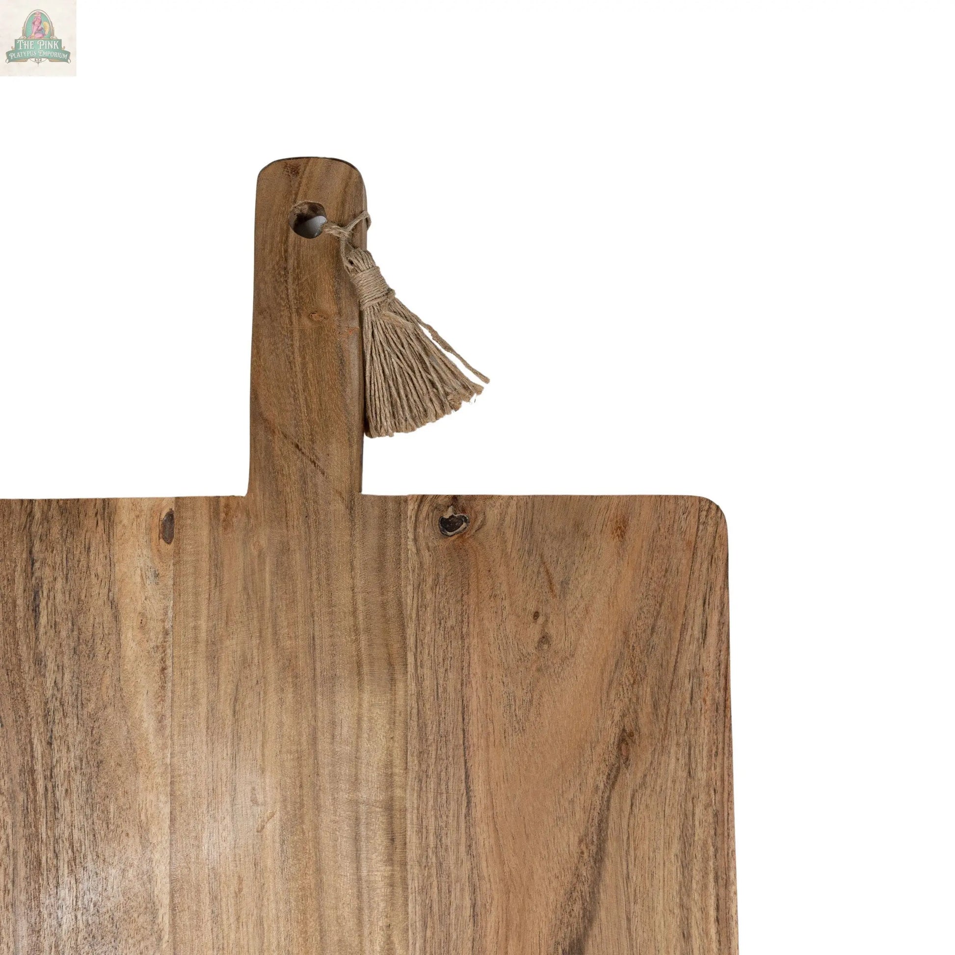 The 38 Inch Oversized Cutting Board/Charcuterie Board is a rectangular acacia wood board with a handle and a tan tassel, ideal for rustic kitchen decor, shown against a plain white background.