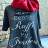 dark gray t-shirt with white text saying "don't ruffle my feathers" and graphics on a dark background