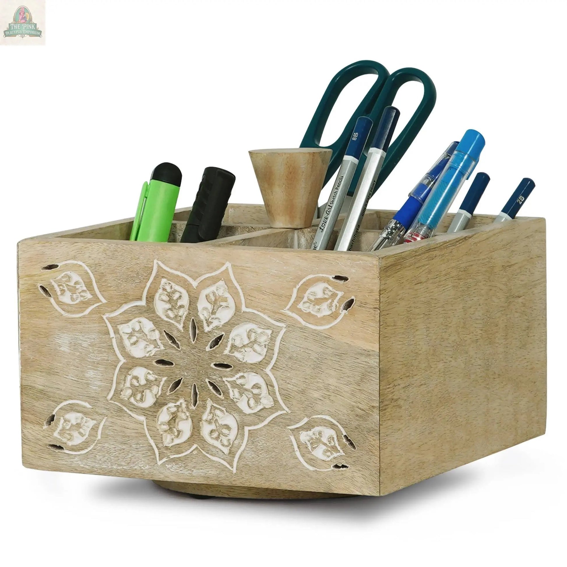 The Serena Spinner 4 Quad in Whitewash is a stylish desk organizer that neatly sorts pens, pencils, scissors, and markers in four separate compartments.