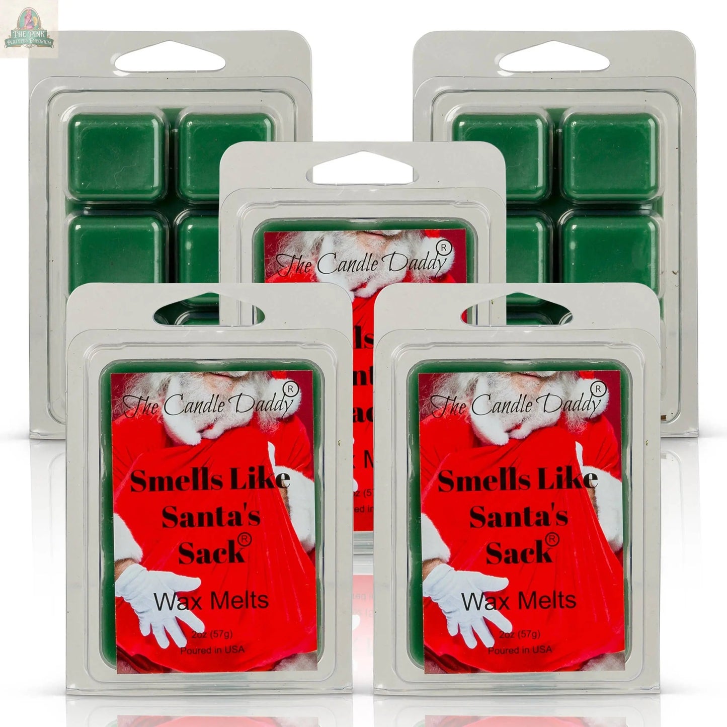 Five packs of wax melts are displayed. Three front packs have red labels reading "Smells Like Santa's Sack - Christmas Brown Sugar Fig." The two packs in the back show green Christmas wax melts in clear, unlabeled packaging.