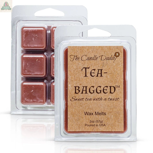 Two packs of Tea-Bagged - Sweet Tea With A Twist Scented Melt- Maximum in plastic clamshells. The brown front label displays the product name, while the back reveals the scented wax cubes inside.