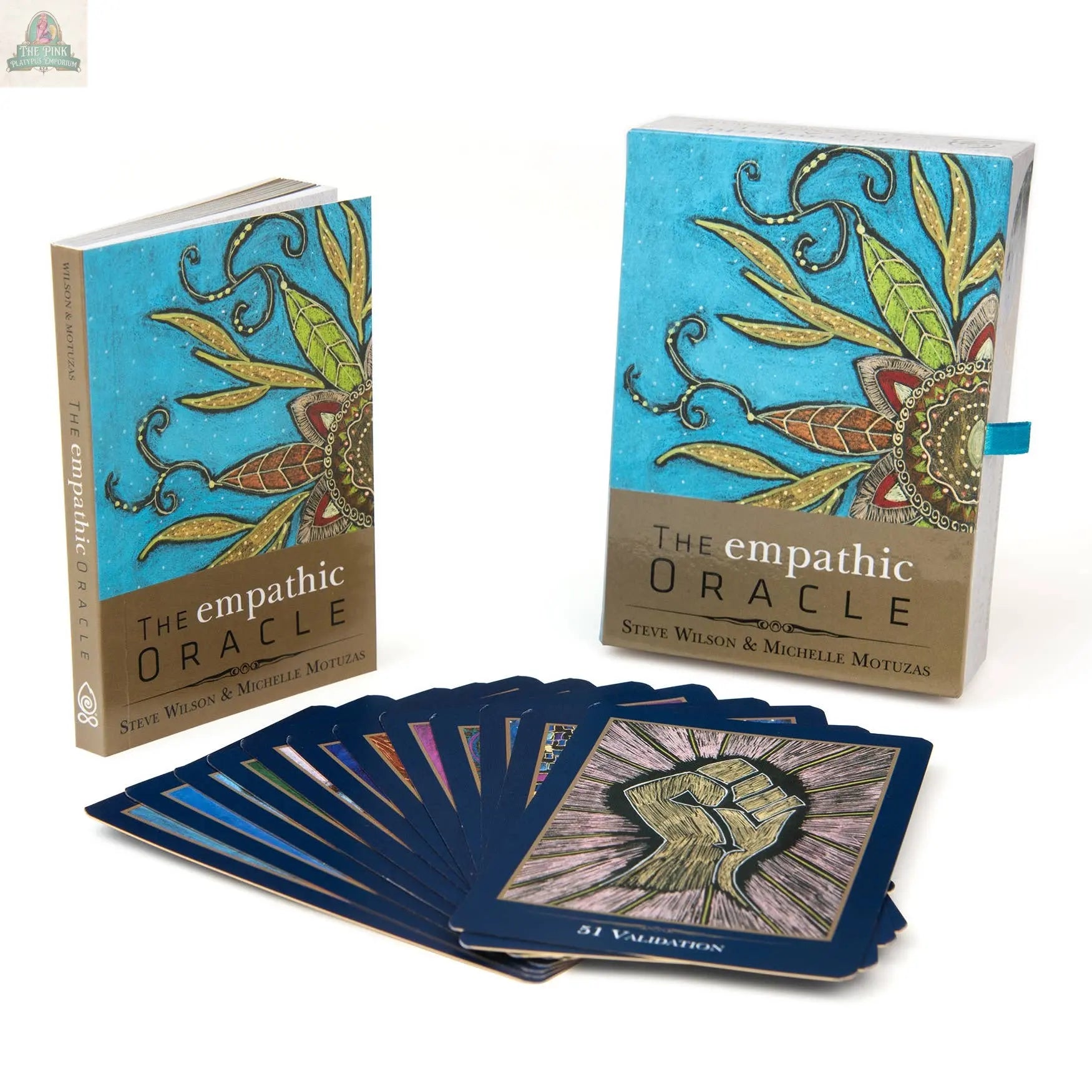 The Empathic Oracle by REDFeather is a card and guidebook set that helps you manage empathic experiences, featuring colorful abstract art on the box, book, and cards.