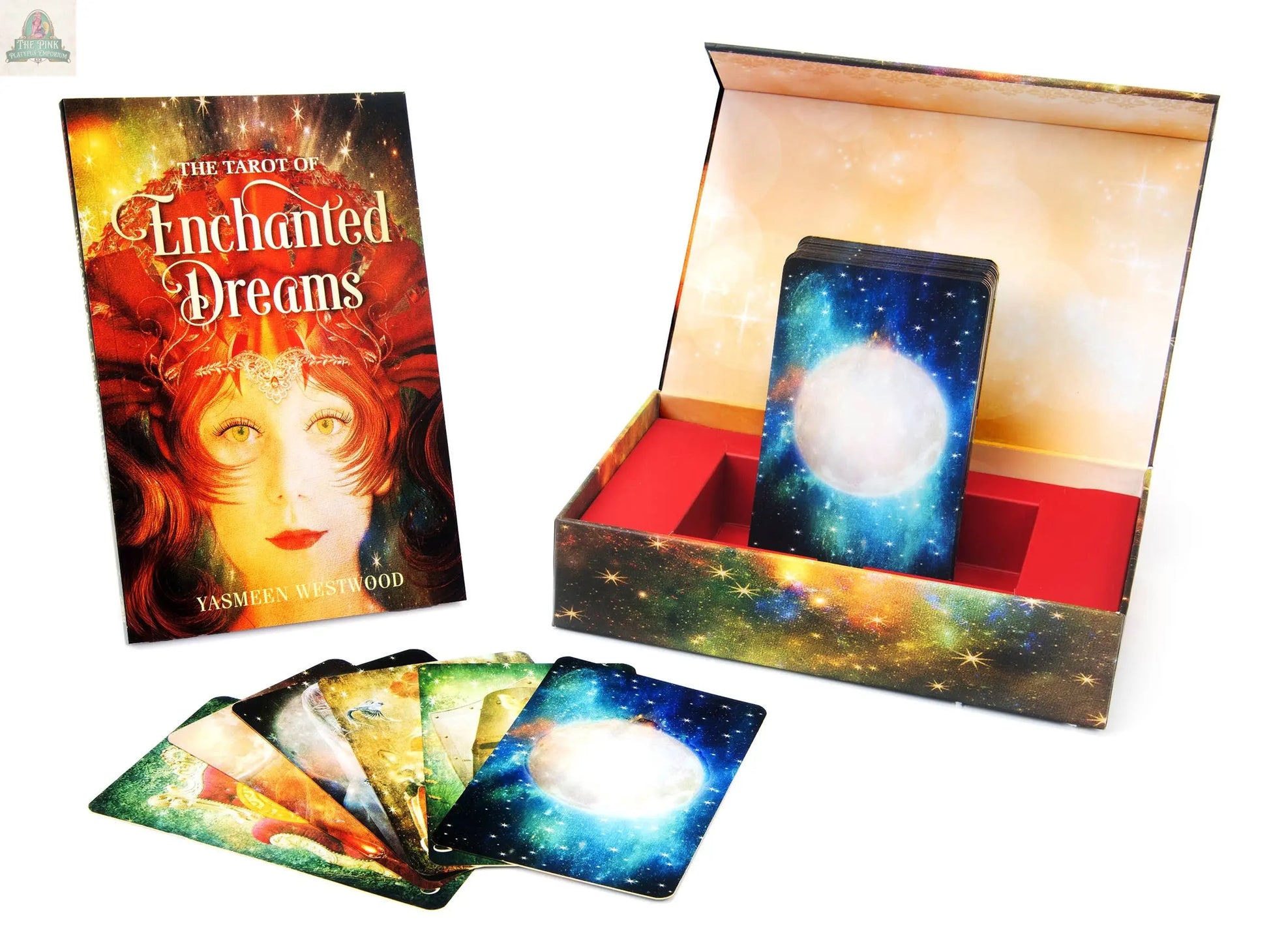 The Tarot of Enchanted Dreams by REDFeather is a captivating tarot deck featuring an illustrated woman's face on the cover, starry box, and glowing moon cards—ideal for inspiring personal growth.