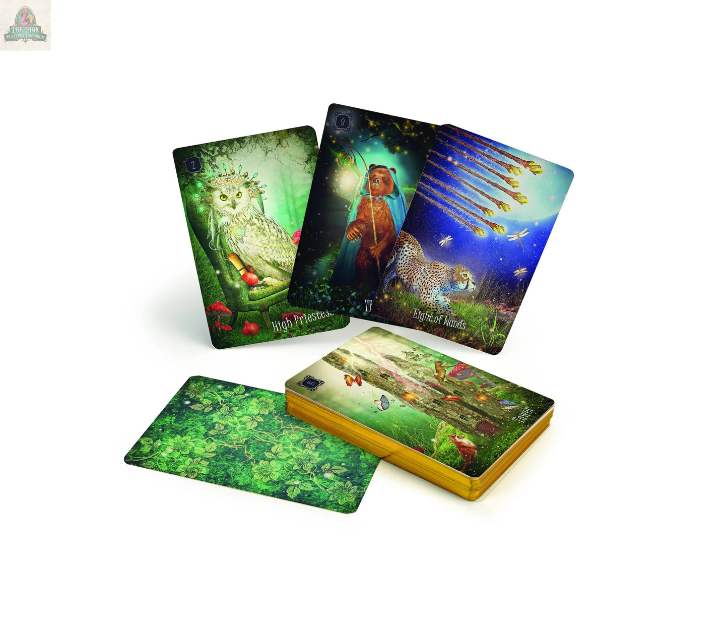 The Westwood Tarot by REDFeather features fantasy-style cards with a wise owl, staff bearer, leopard, and flying wands. The lush green leafy card backs inspire self-discovery in every reading.