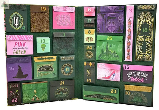 Wicked: The Official Advent Calendar features 25 numbered flaps and envelopes in green, purple, and pink with themed illustrations—perfect for fans seeking unique Wizard of Oz gifts.
