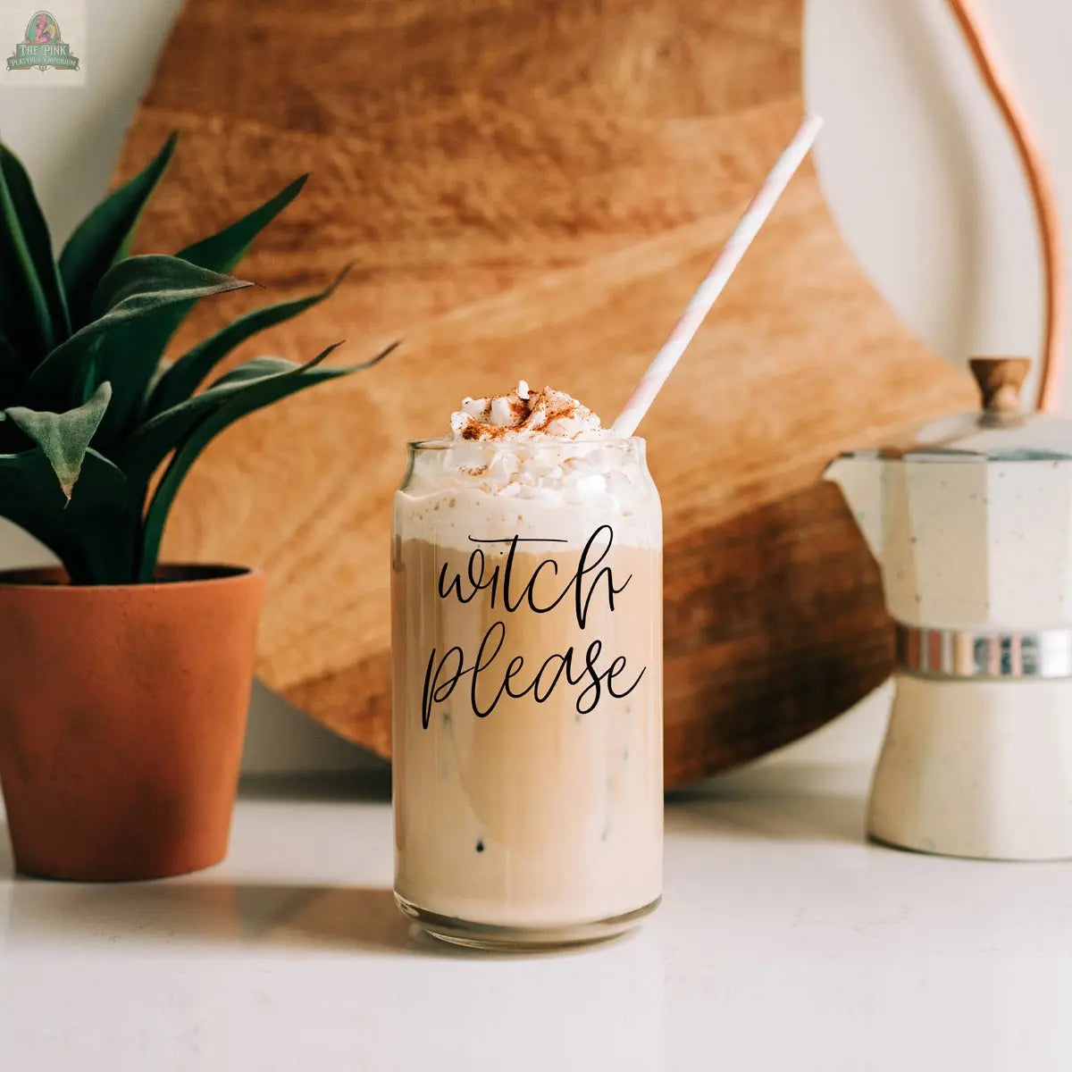 The Witch Please 17oz is a glass drinking cup with a bamboo lid and a stainless steel straw, perfect for enjoying a refreshing drink.