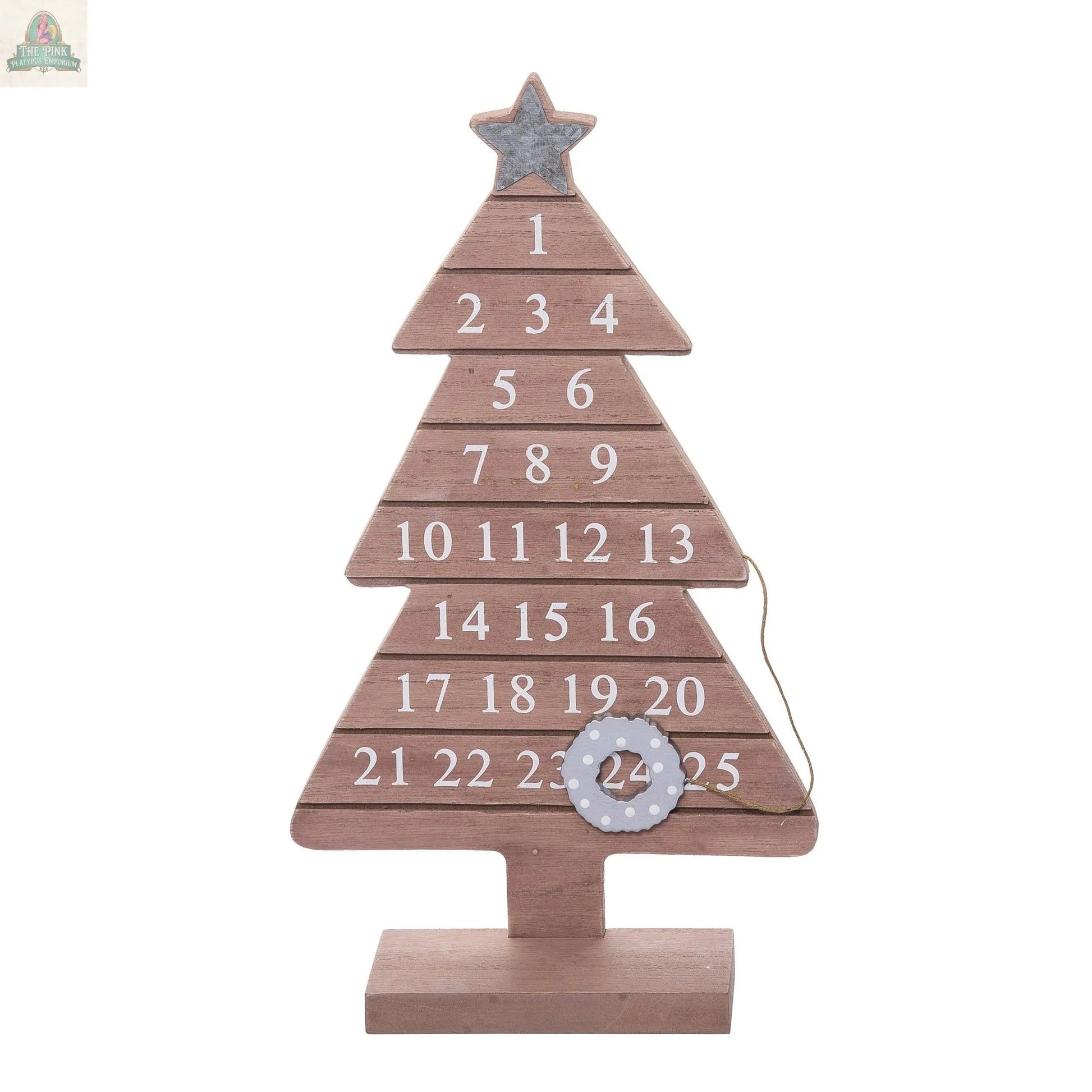 The Wood 13.5" Brown Christmas Countdown Calendar Tree DS features numbers 1-25 in white, a silver star topper, and a small ring on 24, creating a festive Christmas countdown calendar and charming holiday home decor.
