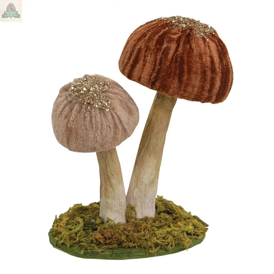 The Woodland Brown Mushrooms Sitter - Small features two decorative velvet mushrooms with brown and beige glittery caps, tall stems, and a base of artificial green moss—ideal for accenting your winter woodland decor.