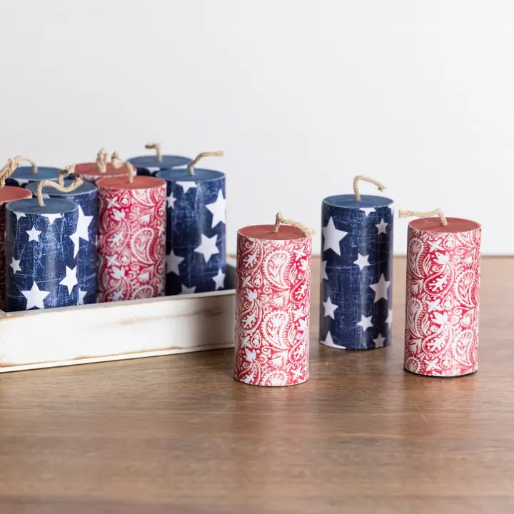 Decorative fireworks set with red, white, and blue patterns on a wooden surface.