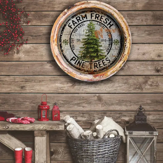 Decorative farmhouse wall decor with 'Farm Fresh Pine Trees' on a wooden wall with rustic decor.