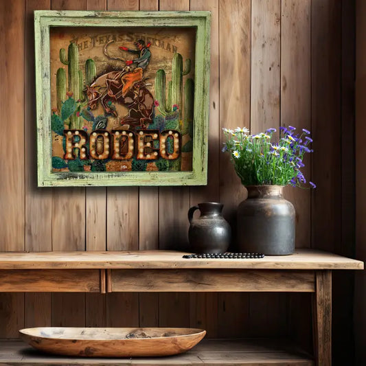 Decorative sign with cowboy and cacti design on a wooden wall above a wooden shelf with decorative items.