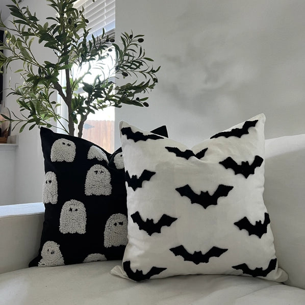 Pink Platypus Emporium 20x20 black Halloween pillow cover with raised white tufted ghost design for spooky fall home decor