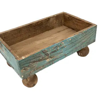 Wooden planter with a rustic design on a white background