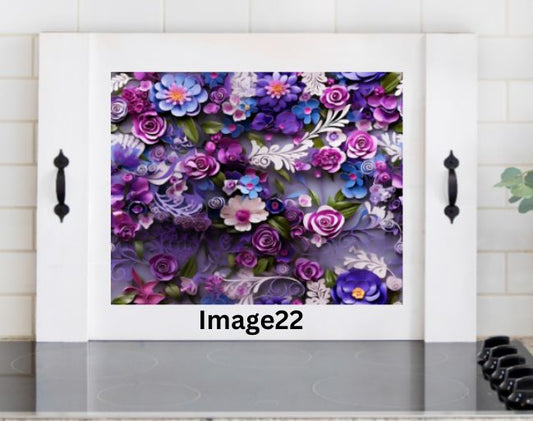 Purple floral wooden stove cover with lavender violet blue and pink flowers, colorful noodle board and decorative stove top cover for kitchen decor.